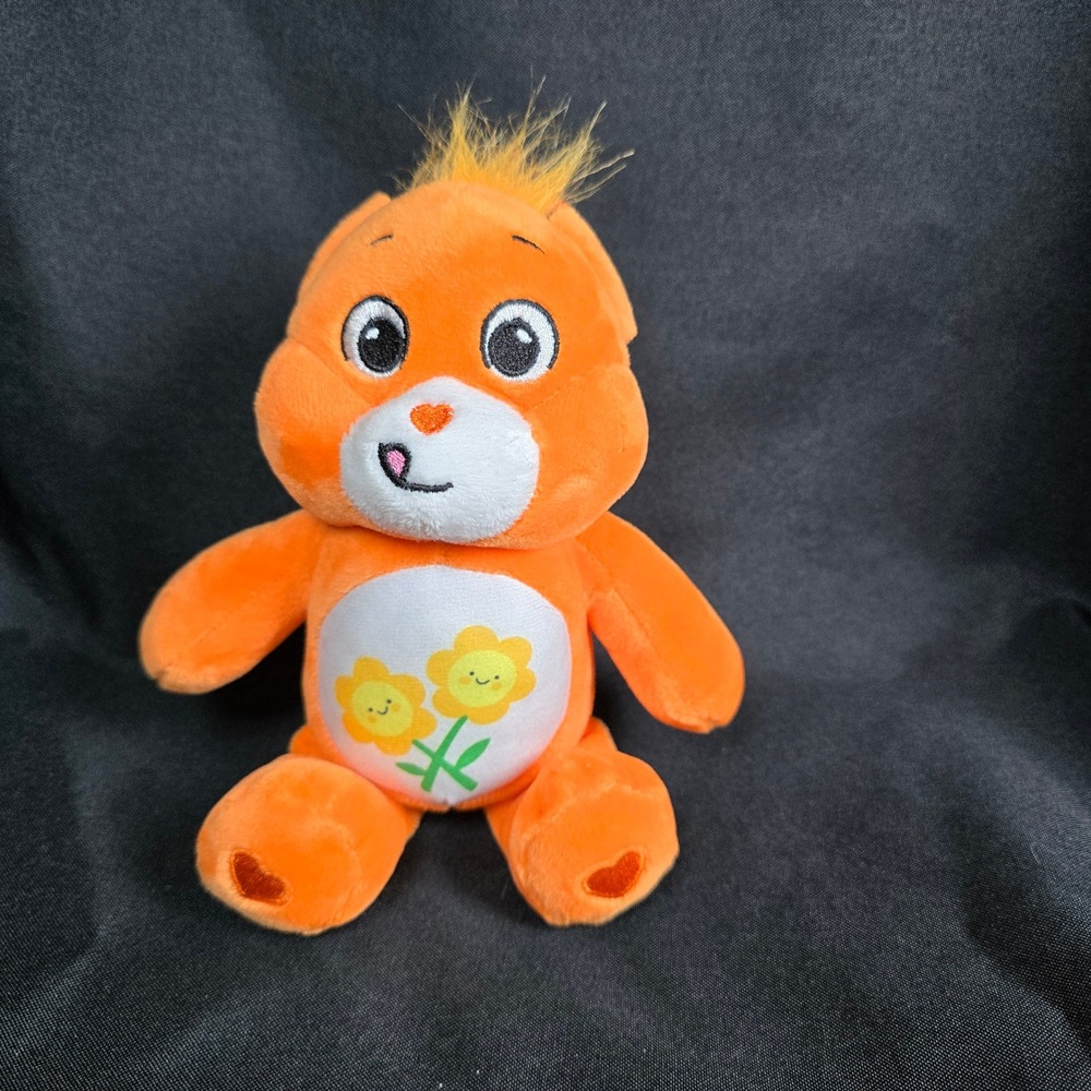 Orange small daisy‎ belly Care Bear